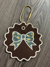 Load image into Gallery viewer, 5” Floral Bow Embroidered Keychain | Fall Bag Charm | Handmade Thrifted Textile Keychain | Floral Purse Charm