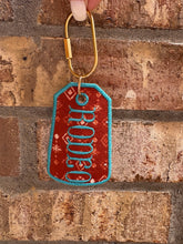 Load image into Gallery viewer, Rodeo Embroidered Keychain | Western Bag Charm | Handmade Thrifted Textile Keychain | Cowgirl Purse Charm | Vintage Fabric Key Chain
