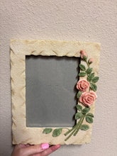 Load image into Gallery viewer, vintage 1980s 5x7” floral picture frame made from resin with a faux stone texture, adorned with 3D pink roses and green leaves
