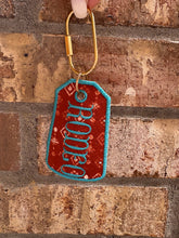 Load image into Gallery viewer, Rodeo Embroidered Keychain | Western Bag Charm | Handmade Thrifted Textile Keychain | Cowgirl Purse Charm | Vintage Fabric Key Chain
