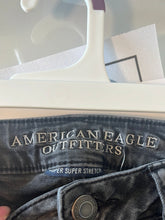 Load image into Gallery viewer, Size 8 American Eagle Black Distressed Jegging Skinny Jeans
