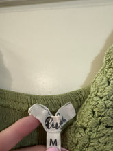 Load image into Gallery viewer, Medium Hint of Blush olive green midi dress featuring a textured crochet V-neck bodice and a tiered, crinkled skirt
