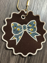 Load image into Gallery viewer, 5” Floral Bow Embroidered Keychain | Fall Bag Charm | Handmade Thrifted Textile Keychain | Floral Purse Charm
