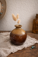 Vintage brown drip glaze pottery bud vase, typically from the 1960s or 1970s