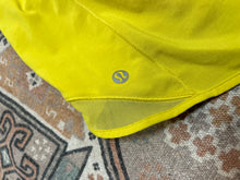 Load image into Gallery viewer, Size 10 Lululemon Yellow Hotty Hot Shorts
