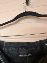 Load image into Gallery viewer, Size 10 American Eagle Black Ultra High Rise Distressed Knee Skinny Jeans
