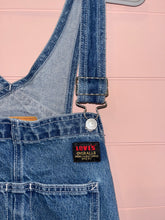 Load image into Gallery viewer, Large Levi’s Denim Distressed Overalls
