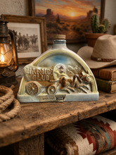 Load image into Gallery viewer, Vintage 1969 Jim Beam "Harold's Club" covered wagon ceramic decanter
