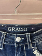 Load image into Gallery viewer, Girls Size 10 Grace LA Cow Skull Raw Hem Flare Jeans
