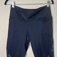 Load image into Gallery viewer, Medium Under Armour Black Camouflage Printed Compression Leggings
