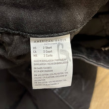 Load image into Gallery viewer, Size 2 Short American Eagle Black Denim Distressed Skinny Jeans
