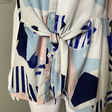 Load image into Gallery viewer, Size Medium Torrid NWOT MULTI GEO GEORGETTE PEPLUM TIE FRONT SLEEVELESS BLOUSE
